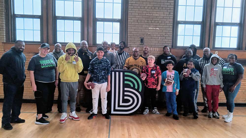 Touchdown for Teamwork: Alpha Phi Alpha Partners with Big Brothers Big Sisters!